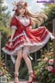 A woman in a red and white dress posing for a picture.